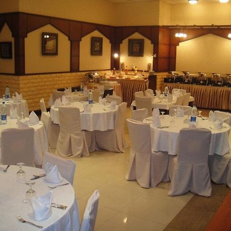 L'Arabia Hotel Apartments Абу Даби Ресторант снимка