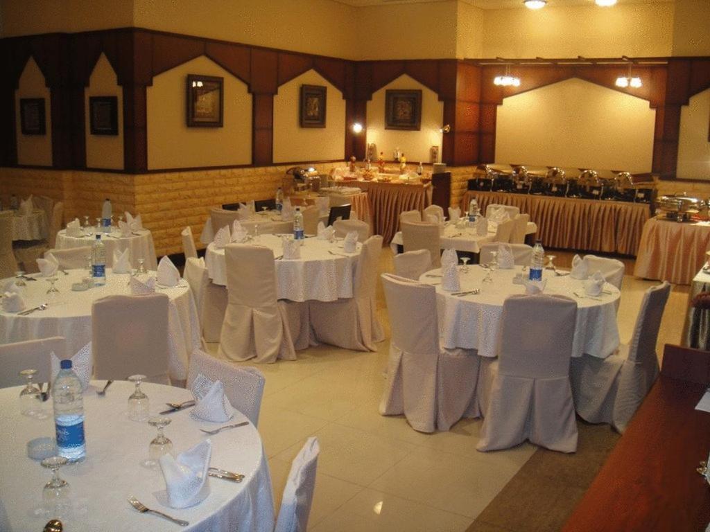 L'Arabia Hotel Apartments Абу Даби Ресторант снимка